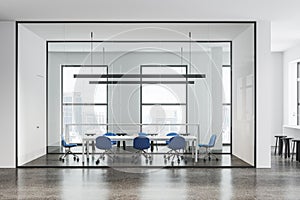 White conference room interior with table and chairs, panoramic window