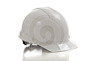 White construction workers hard hat on white