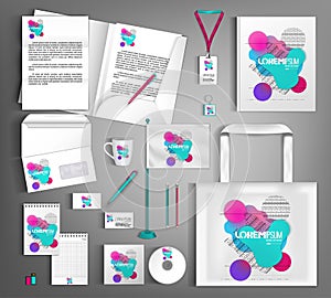 White corporate identity design template with multi-colored shapes of fluid and geometry.