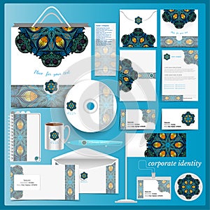 White corporate identity template with blue mosaic peacock elements. Vector company style