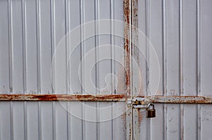 White corrugated metal or zinc texture surface or galvanize steel in the vertical line background