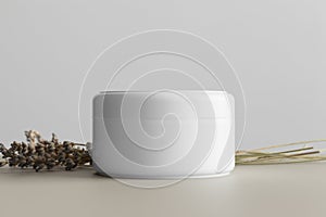 White cosmetic cream jar mockup with a lavender on the beige table