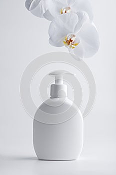 White cosmetic dispenser bottle of shampoo or lotion mock-up