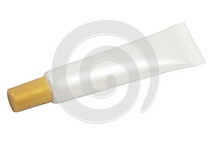 White cosmetic tube with golden lid for cream Beauty product package template isolated on white background with clipping path