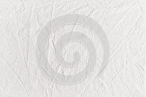 White cotton canvas fabric texture with creases.