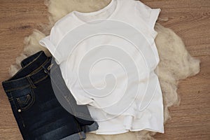 White cotton T-shirt and denim shorts mockup. Woman shirt mock ups. Blank clothes template mock up. Flat lay styled stock photo