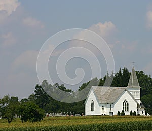 White country church with steeple photo