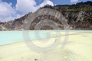 White Crater or Kawah Putih, a volcanic sulfur crater lake in a caldera in Indonesia.