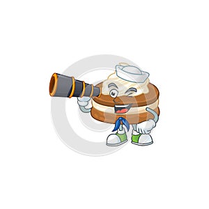 White cream alfajor in Sailor cartoon character design with binocular