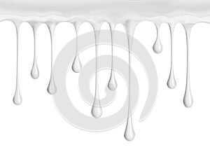White cream or milk drops drip down, isolated on a white
