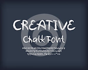 White creative chalk font on dark gray chalkboard