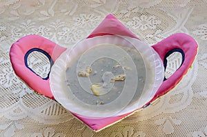 White Crockery Dish With Soup In Soup Bowl Cozy