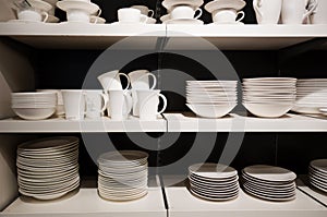 White crockery on shelves