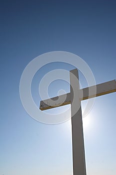 White cross with blue sky