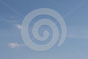 White cross lines on blue sky