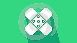 White Crossed bandage plaster icon isolated on green background. Medical plaster, adhesive bandage, flexible fabric