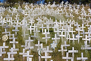White crosses on a hillside