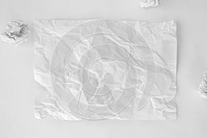 White crumpled paper backdrop on white background. Backplate for your text