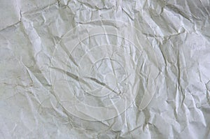 White crumpled paper blank background surface. Pastels book cover paint top view; Gray grunge surface empty parchment sheet. Art
