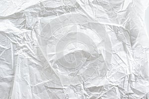 White crumpled paper texture background.