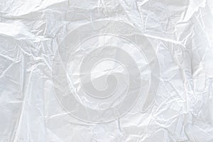 White crumpled paper texture background.