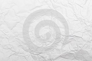 White crumpled paper texture background.