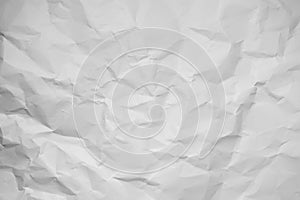 White crumpled paper texture background, clean white wrinkled paper, top view.