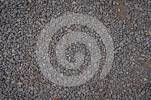 White crushed stones texture background. Gray rubble construction rock pebble pattern.