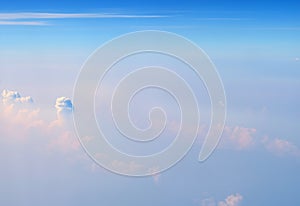 White Cumulonimbus and Altostratus Clouds in Infinite Blue Sky - Aerial View - Abstract Natural Background photo