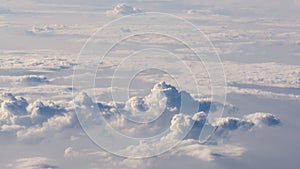 White cumulus clouds on clear blue sky background closeup