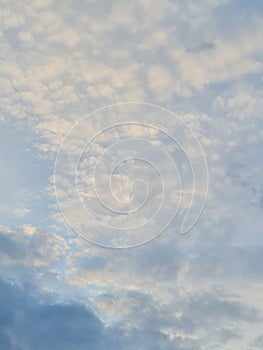 white cumulus clouds over the city