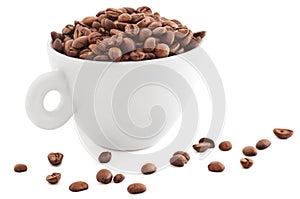 White cup with coffee beans