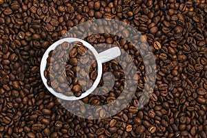 White cup with coffee beans