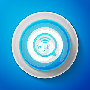 White Cup of coffee shop with free wifi zone sign isolated on blue background. Internet connection placard. Circle blue