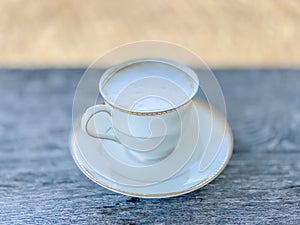 White cup hot coffee cappuccino on wood table