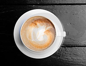 White cup of hot coffee latte