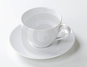 White cup and saucer