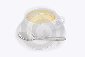 White cup on a saucer