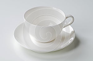 White cup and saucer