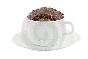 White cup and saucer with coffee beans