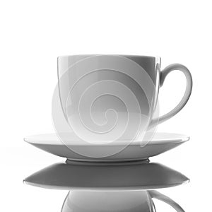 White cup and saucer on white