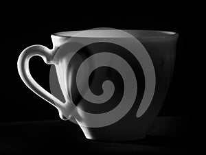 White cup with shadow heart