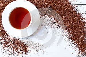 White cup of tasty traditional organic red rooibos