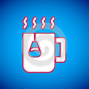 White Cup of tea with tea bag icon isolated on blue background. Vector