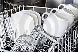 White cups in new dishwasher