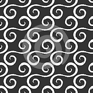 White curlicues drawn with a rough brush. Black background. Seamless pattern. photo