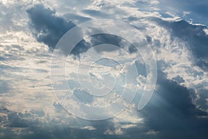 White curly clouds in a blue sky. Sky background,