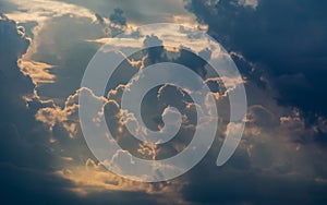 White curly clouds in a blue sky. Sky background sunset,