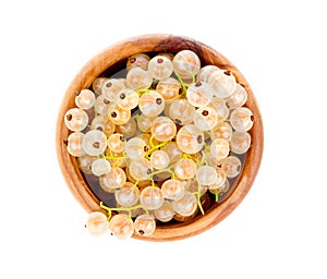 White currant fruit in a wood bowl