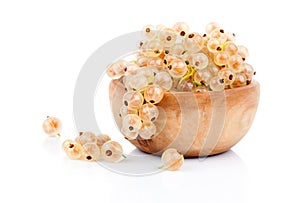 White currant fruit in a wood bowl